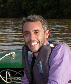 Tom Houslay on a boat